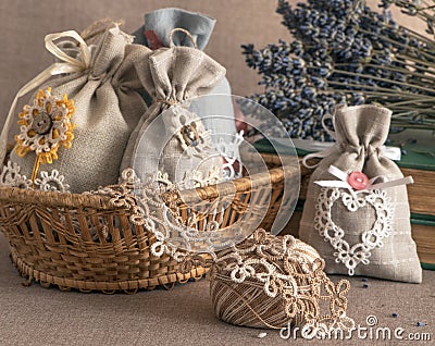 Aromatic Textile sachet pouches decorated with tatting lace with of dried lavender flowers Stock Photo