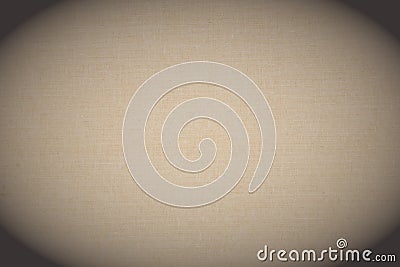 The textile surface in beige. Book cover. Light backdrop. Top view. Circular vignetting. Macro Stock Photo