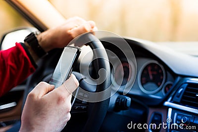 Texting and driving Stock Photo