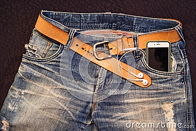 Texture background of jeans , belt detail with mobilephone and e Stock Photo