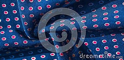 Texture background, pattern, blue silk fabric with red polka dots. Light and silky-soft satin pendant is perfect for your design, Stock Photo