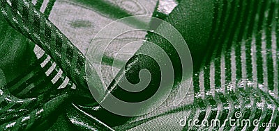 Texture, background, pattern, collection, light transparent silk fabric with stripes of different size, green. exquisite luxury Stock Photo