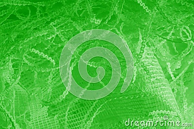 Texture, background, pattern. green tulle. Thin with a heavier weight, insert into your design or add a clean element to the look Stock Photo
