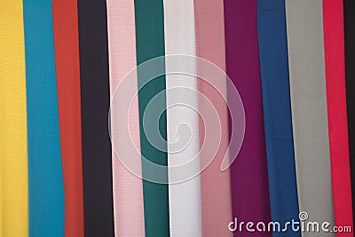 Texture or background of Woven fabric, colorful display hangers. Stock Photo