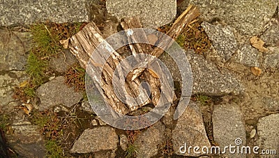 texture beauty stone and wood together broken stone fence fence Stock Photo