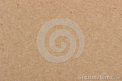 Texture of beige cardboard, plywood of uniform structure and lighting. Stock Photo