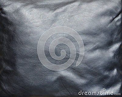 Texture of black leather or dermantin with folds, used as material for women`s and men`s bags, suitcases, pillows for office so Stock Photo