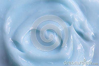 Texture of blue cosmetic cream. View from above. Stock Photo