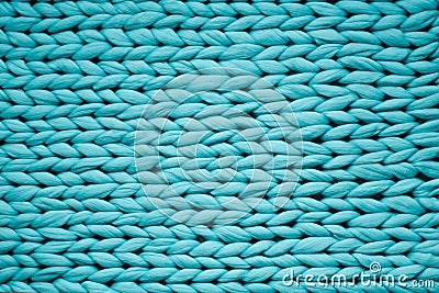 Texture of blue knit blanket. Large knitting. Plaid merino wool. Top view Stock Photo