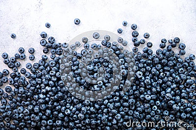 Texture of blueberry berries close up. Border design. Fresh blueberries background with copy space for your text. Vegan Stock Photo