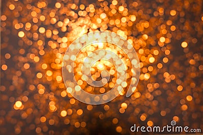 Texture of blurry gold sparkling Christmas lights. Stock Photo