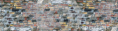 Texture brick narrow background stone base. Colorful wall of the house Stock Photo