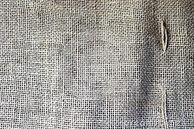 Texture of brown old canvas, linen natural material with a coarse perpendicular interlacing of the fibers of the fabric Stock Photo