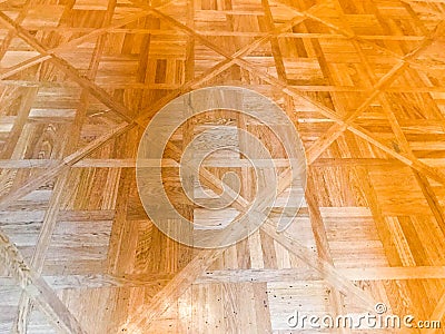 Texture of brown textured yellow wooden floor, parquet of small rectangular plates, lacquered wood plank boards. The background Stock Photo