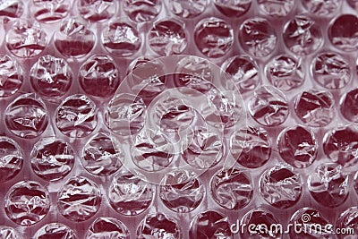 Bubble wrap on the red background Stock Photo
