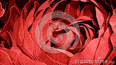 The texture of a bud of red flower made of paper. Stock Photo