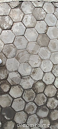 The texture of concrete hexagonal paving tiles close-up Stock Photo