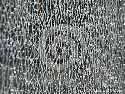 Texture of cracks on a broken glass showcase Stock Photo