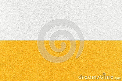 Texture of craft white and bright yellow paper background, half two colors, macro. Vintage dense orange cardboard Stock Photo