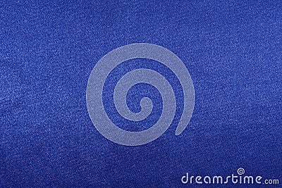 texture of deep blue fabric with glare close-up. background for your design. material for sewing festive costumes, toys and Stock Photo