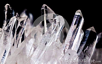 Texture of gemstone clear rhinestone closeup as a part of cluster geode filled with rock Quartz crystals. Stock Photo