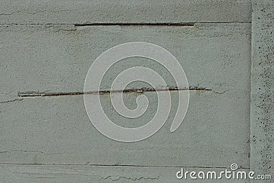 gray concrete wall with brown iron rusty rods Stock Photo
