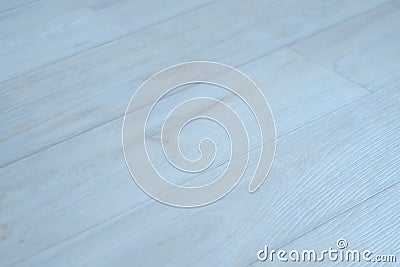 The texture of gray linoleum surface on the floor with wooden pattern. Stock Photo