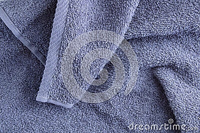 Texture of a gray terry towel with edged edge closeup. Home textiles Stock Photo