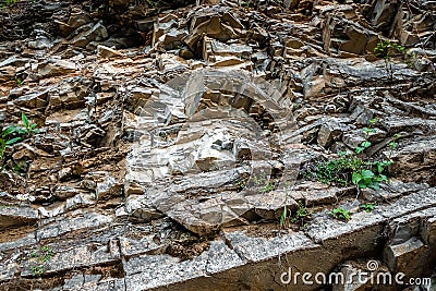 The texture of hewn stone, the edge of the destroyed rock Stock Photo