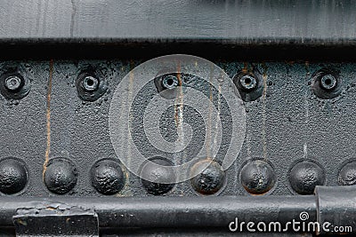 Texture of metal surface, metal worn background with rivets Stock Photo
