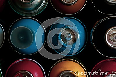 Texture of multi-colored spray cans with paint for graffiti Stock Photo