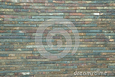 Texture of a multi-colored wall of bricks Stock Photo