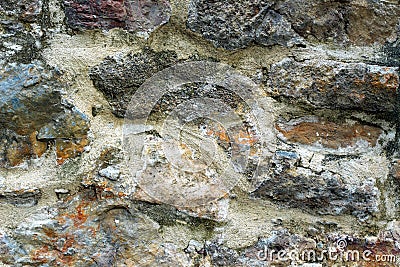 Texture of old antique wall with ancient colored masonry Stock Photo