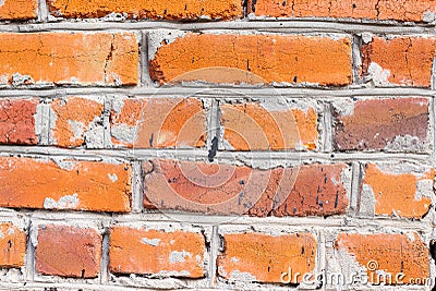 Texture of the old red brick wall with cracks. Background of old brick masonry made of clay bricks Stock Photo