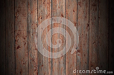 The texture of an old rustic wooden fence made of flat processed boards. Detailed image of a street fence of a rustic type made o Stock Photo