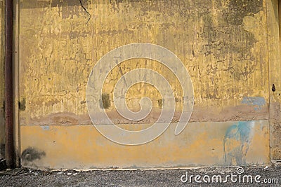 Texture of old yellow vintage wall of warehouse Stock Photo