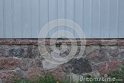 Texture of a part of a gray metal fence wall Stock Photo