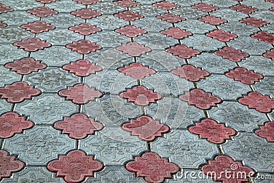 The texture of paving slabs natural background. Brown gray background of stone square paving slabs Stock Photo