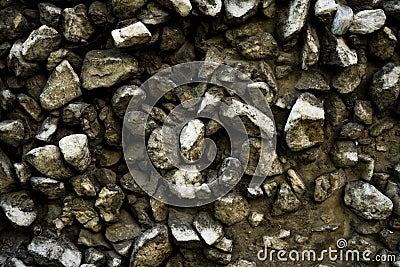 Texture photo of rough concrete plaster with sprinkled gravel Stock Photo