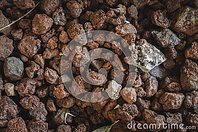 Texture of piled brown stones. Detailed photography of stacked stones Stock Photo