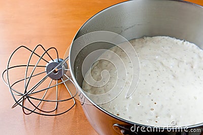 Texture of rising bread dough in a mixing bowl. Stock Photo