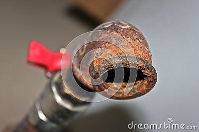 Texture rust on the faucet for water. Rusty crane for industrial Stock Photo