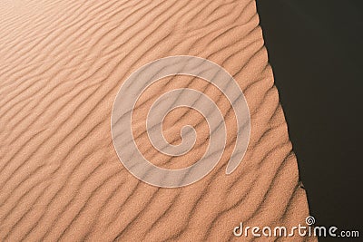 Texture of Sahara desert dunes. Stock Photo