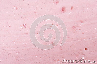 Texture of a slice of a tasty boiled sausage macro Stock Photo