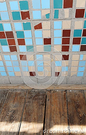 Texture of small square tiles and wooden floor. Beige, blue, turquoise and brown Stock Photo