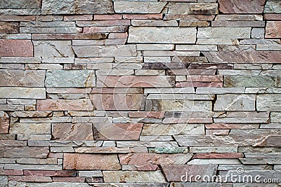 Texture of a stone wall. Part of a stone wall, for background or Stock Photo