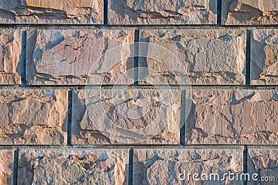 The texture of a stone wall of rectangular stones Stock Photo