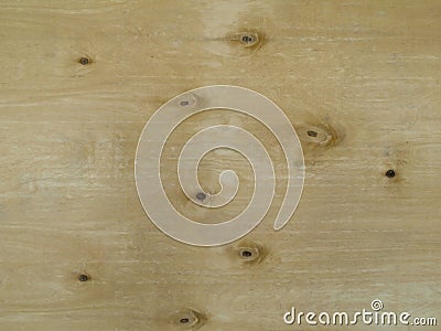 The texture of the surface of the sheet of birch plywood with knots. Stock Photo