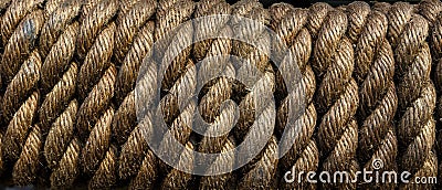 Texture tightly wound rope close up. Low key. Stock Photo