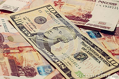 Texture of various international banknotes and paper money, 10 dollars on the background of 5000 rubles Stock Photo